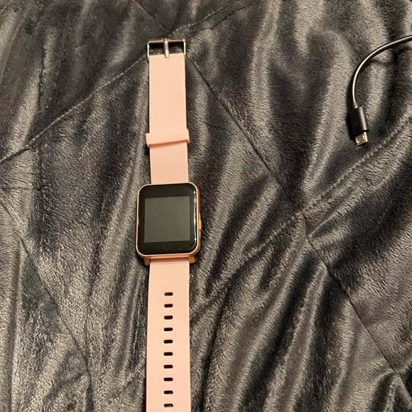 q7 sport rose goldtone smart watch